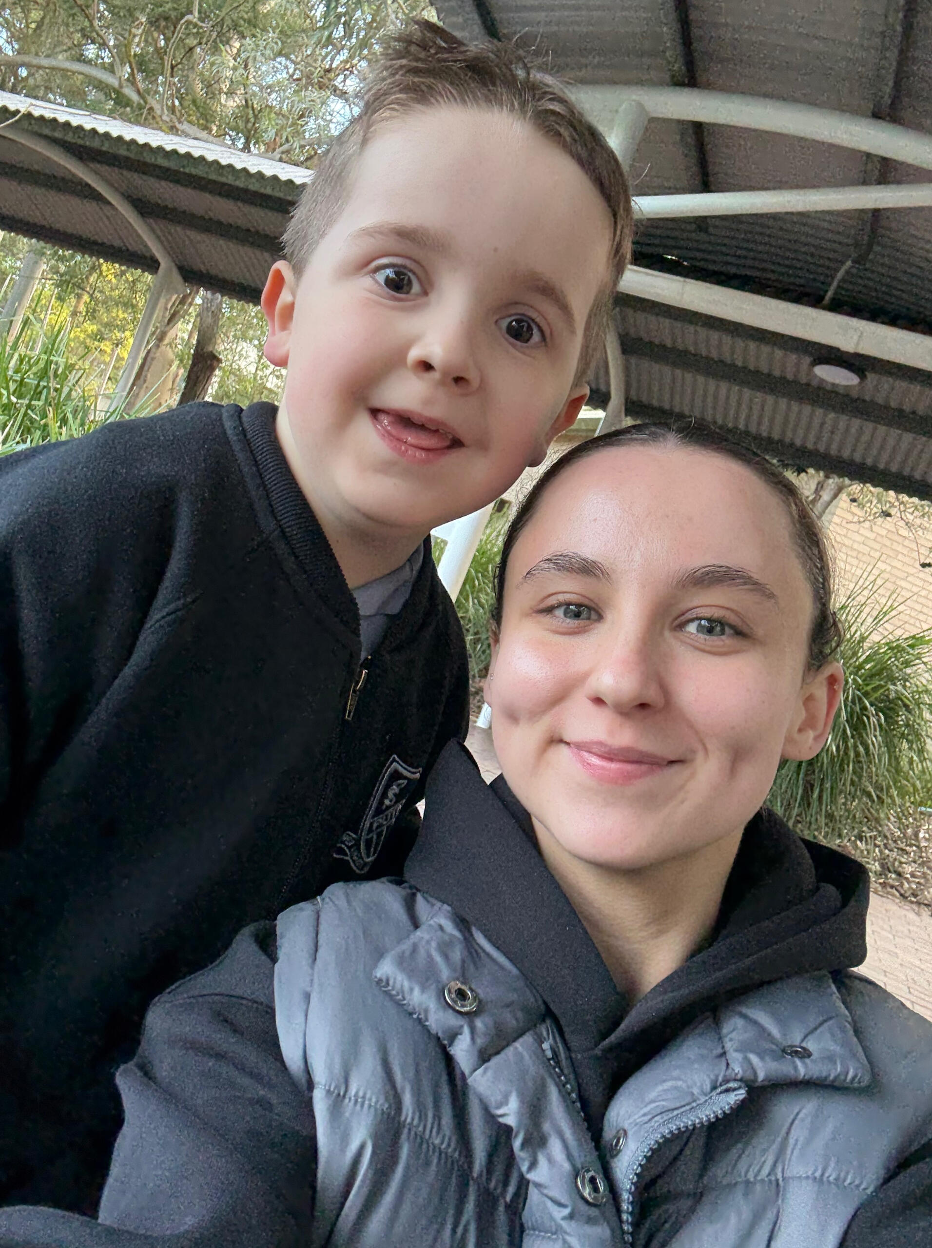 young-boy-playing-with-carer